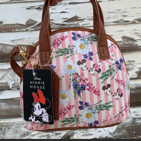 Disney Handbags - NWT Disney Small Crossbody, pink and white stripes plus a floral Minnie motif